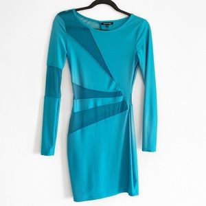 Sleek, chic and unique. Mesh detail short dress.